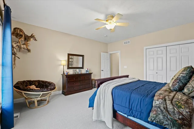 a bathroom with a sink toilet and a mirror