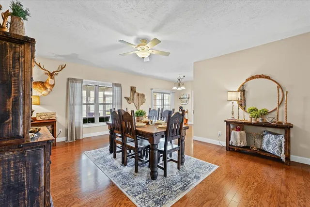 a view of a dining room with furniture
