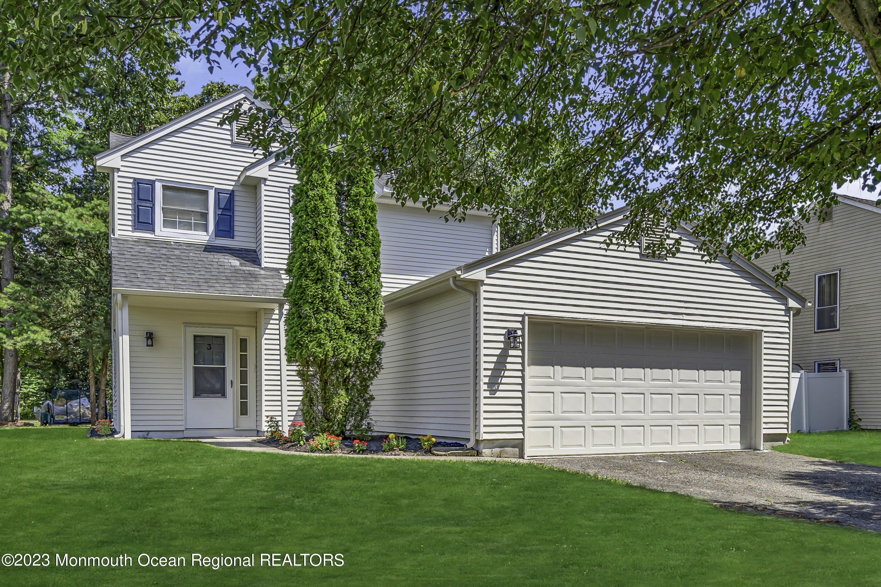3 Sami Drive Howell, NJ 07731 - Photo 1 of 32 a front view of a house with a garden and yard