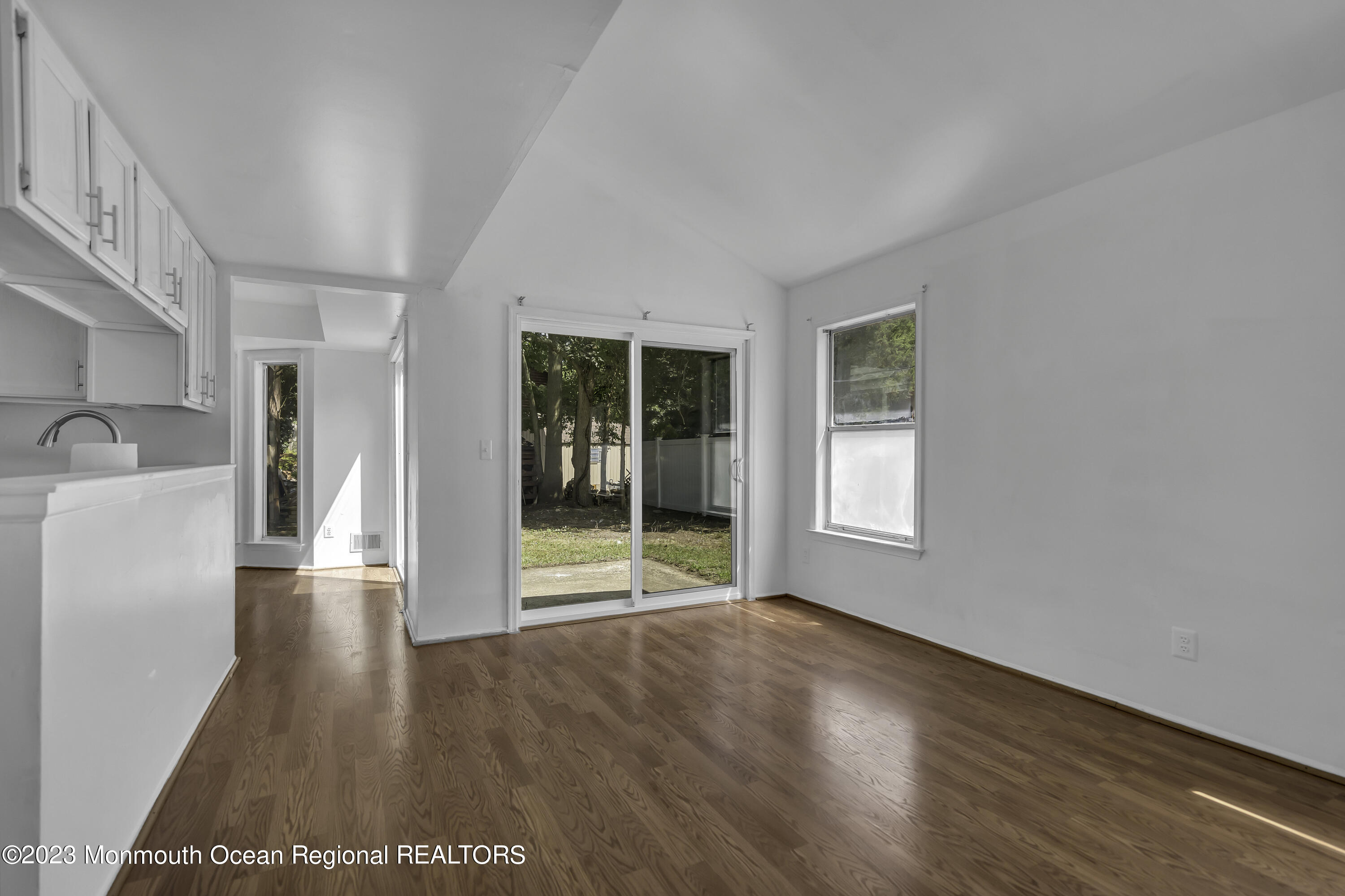 3 Sami Drive Howell, NJ 07731 - Photo 17 of 32 a view of livingroom with furniture and wooden floor