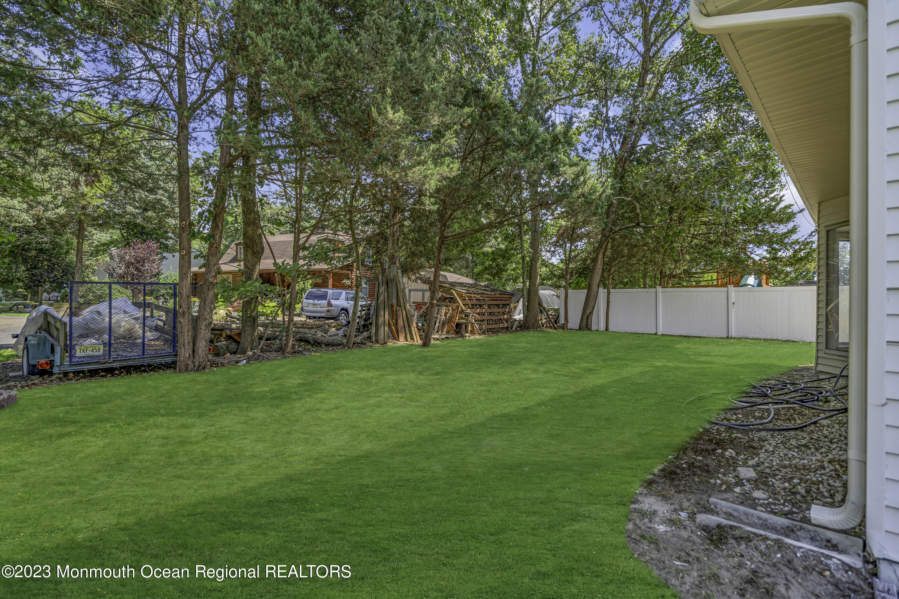 3 Sami Drive Howell, NJ 07731 - Photo 28 of 32 a view of yard with grass and trees