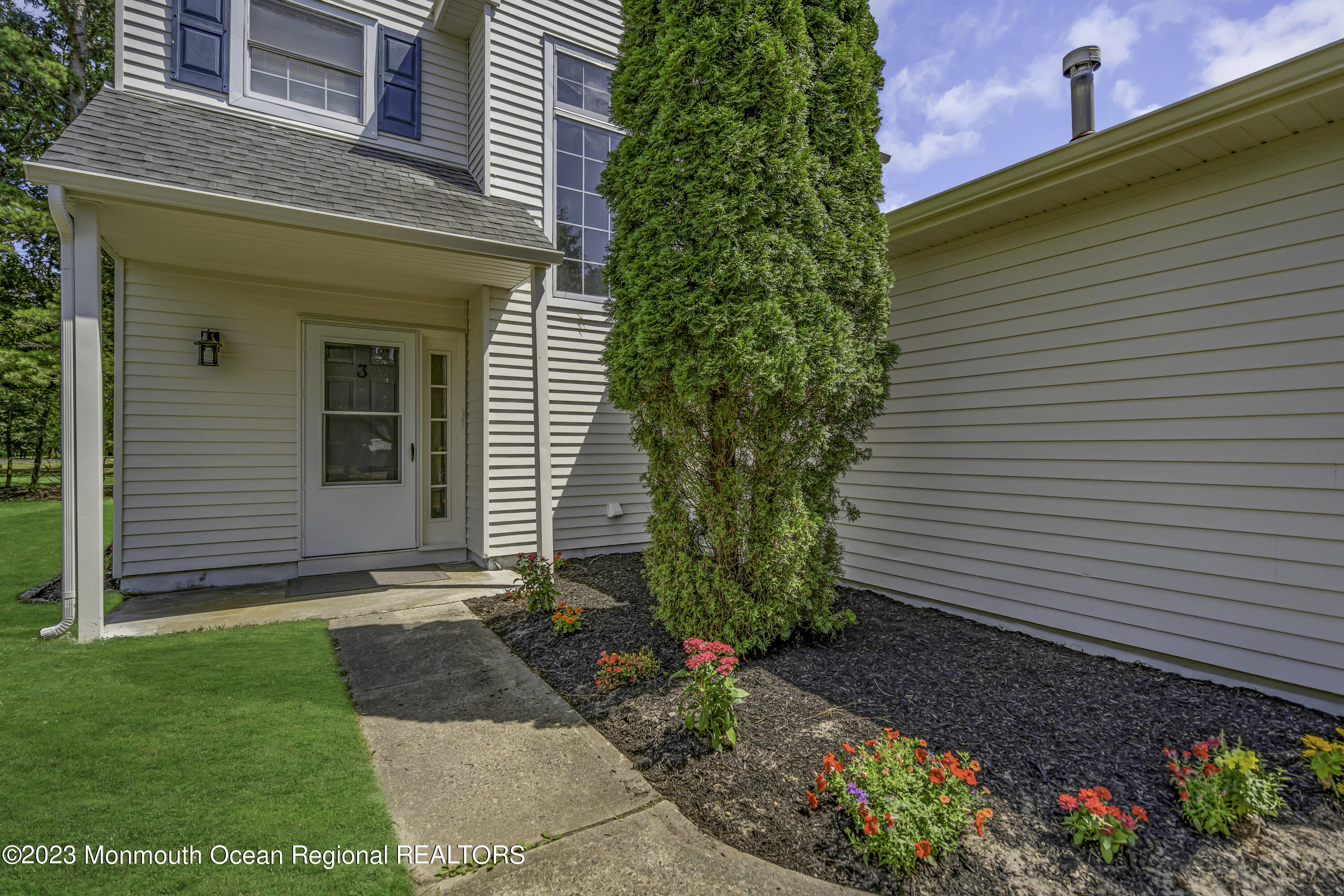 3 Sami Drive Howell, NJ 07731 - Photo 7 of 32 a front view of a house with a garden