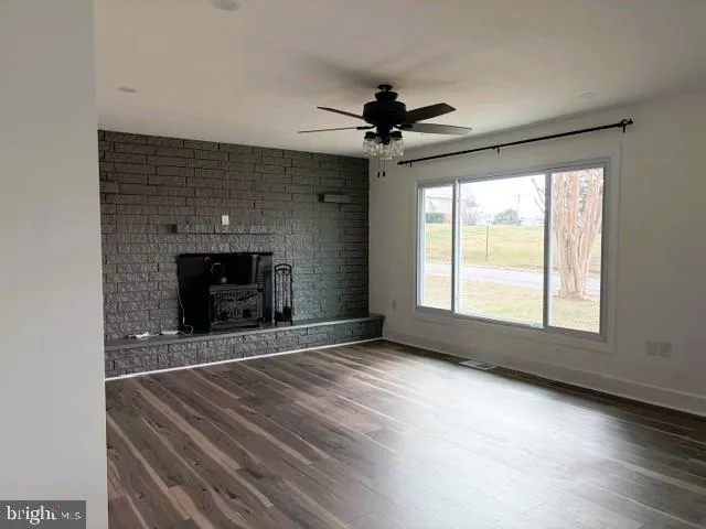 a bathroom with a shower and toilet