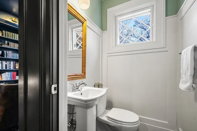 a bathroom with a sink and toilet