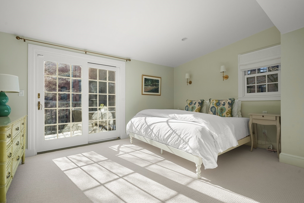 3 Mount Vernon Square, Unit 2 Boston, MA 02108 - Photo 19 of 33 a spacious bedroom with a bed and a window