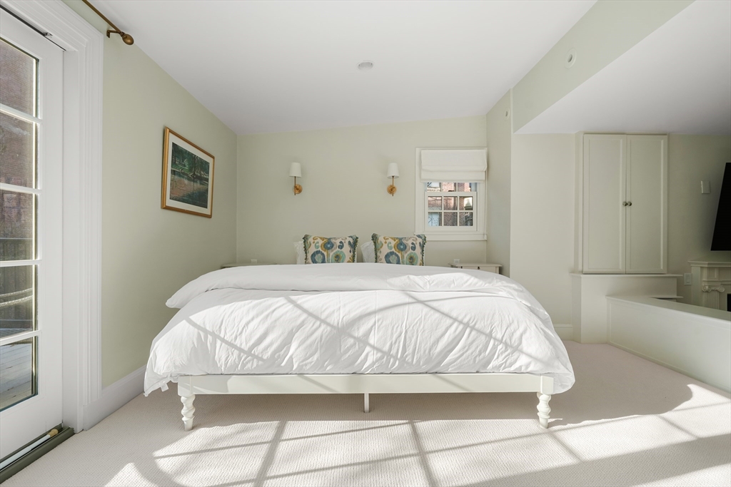 3 Mount Vernon Square, Unit 2 Boston, MA 02108 - Photo 21 of 33 a bedroom with a bed and a bathroom