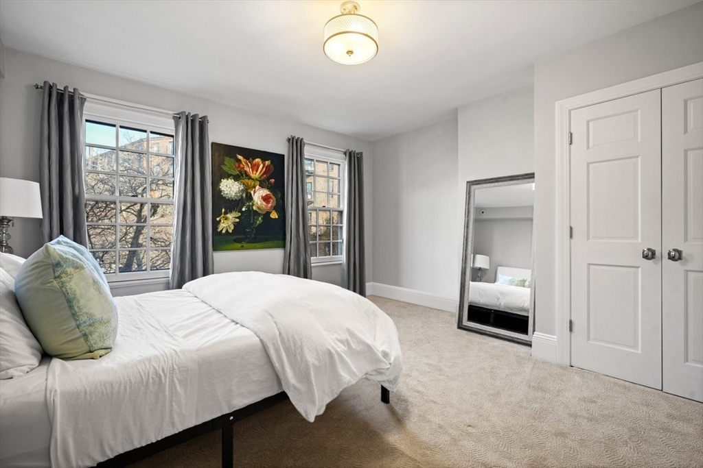 3 Mount Vernon Square, Unit 2 Boston, MA 02108 - Photo 26 of 33 a bedroom with a bed and a window