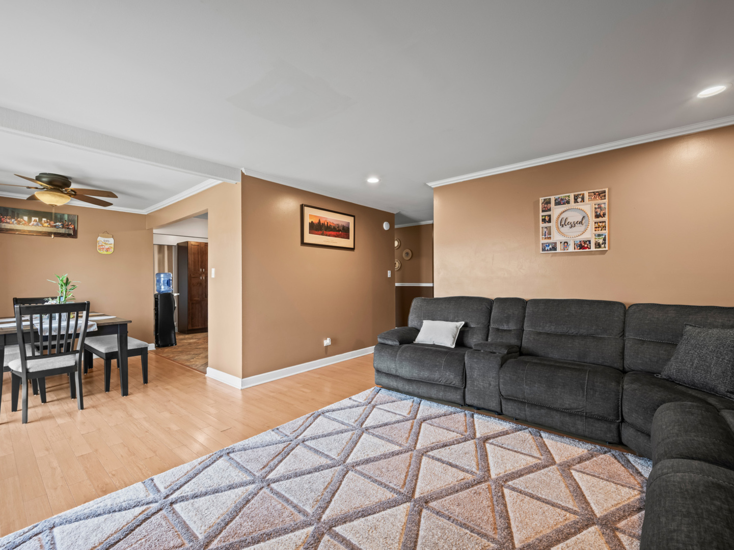 1905 Pierce Road Hoffman Estates, IL 60169 - Photo 13 of 27 a living room with furniture and a dining table with wooden floor