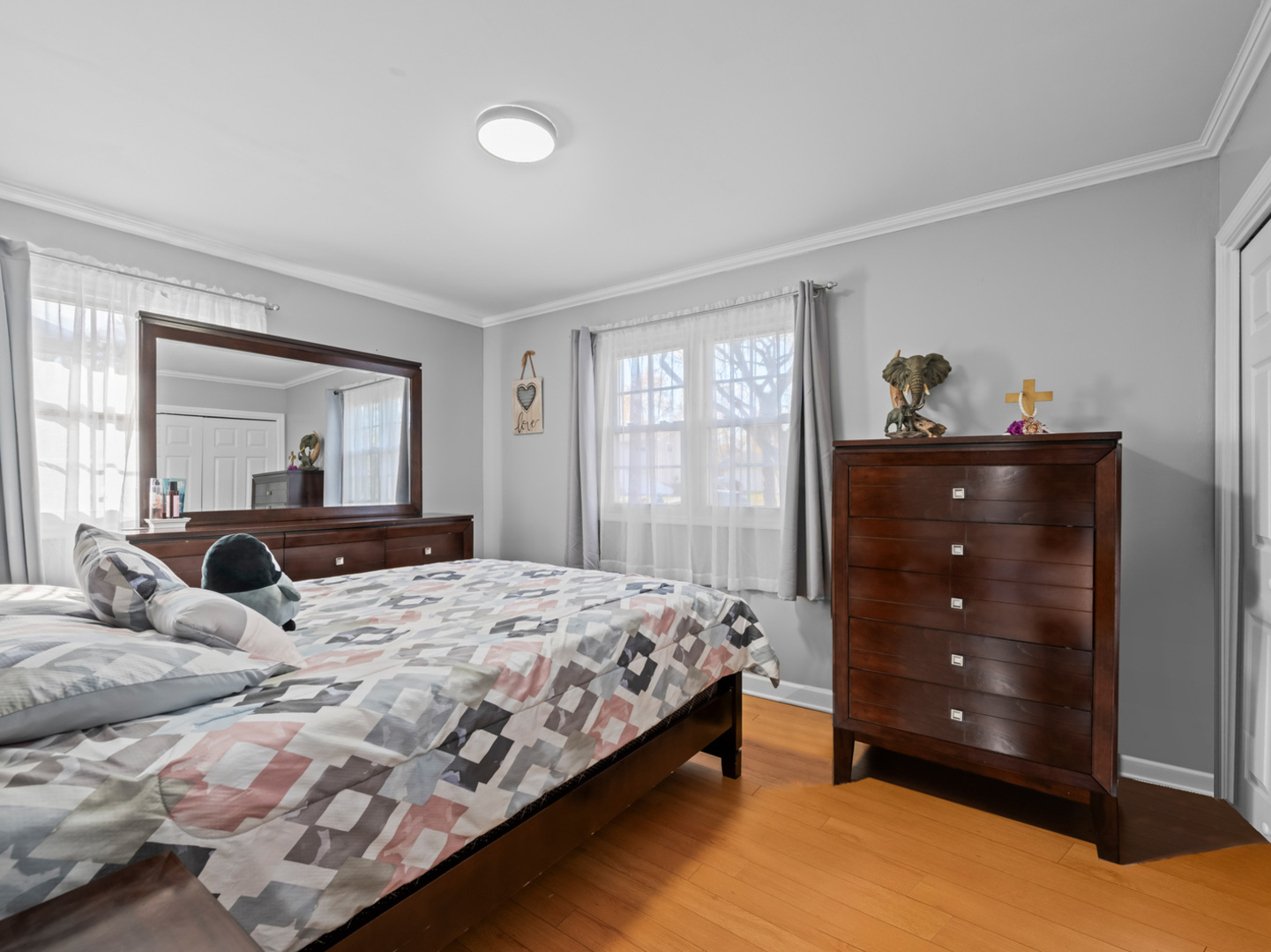 1905 Pierce Road Hoffman Estates, IL 60169 - Photo 14 of 27 a bedroom with a bed and a closet