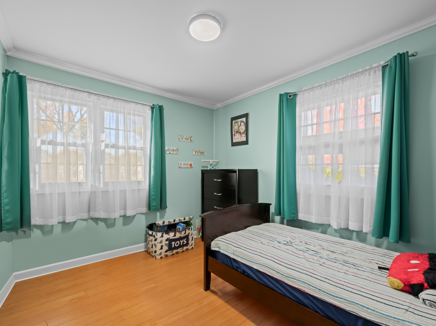 1905 Pierce Road Hoffman Estates, IL 60169 - Photo 16 of 27 a bed room with a bed and a television