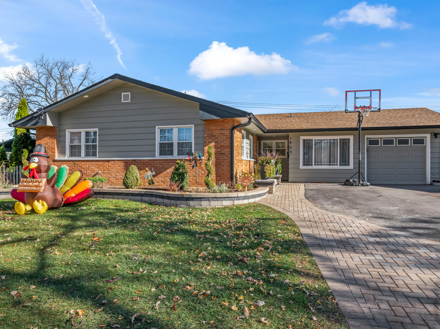 1905 Pierce Road Hoffman Estates, IL 60169 - Photo 2 of 27 a view of a house with a yard patio and fire pit