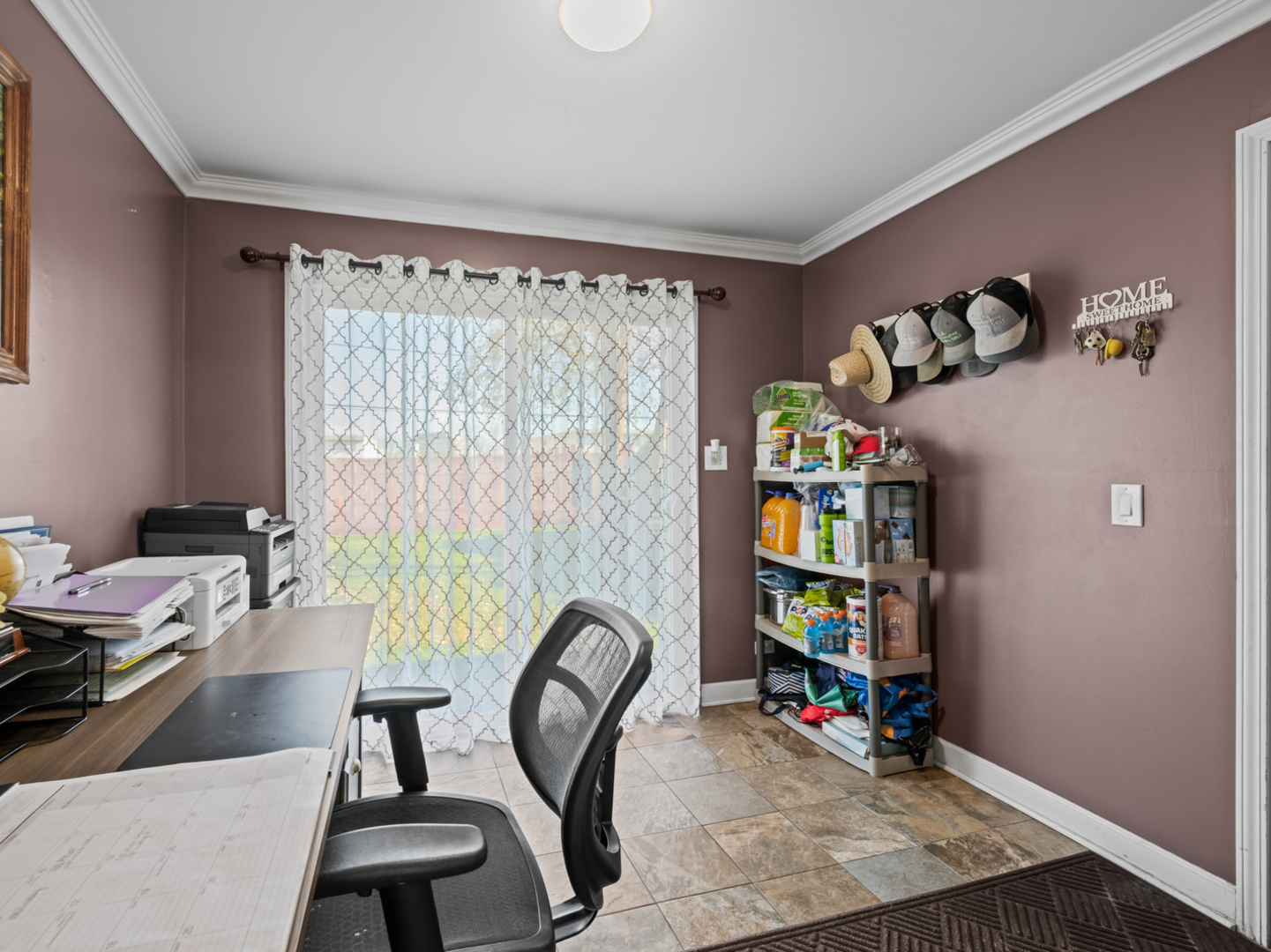 1905 Pierce Road Hoffman Estates, IL 60169 - Photo 21 of 27 a view of a workspace with furniture and a window