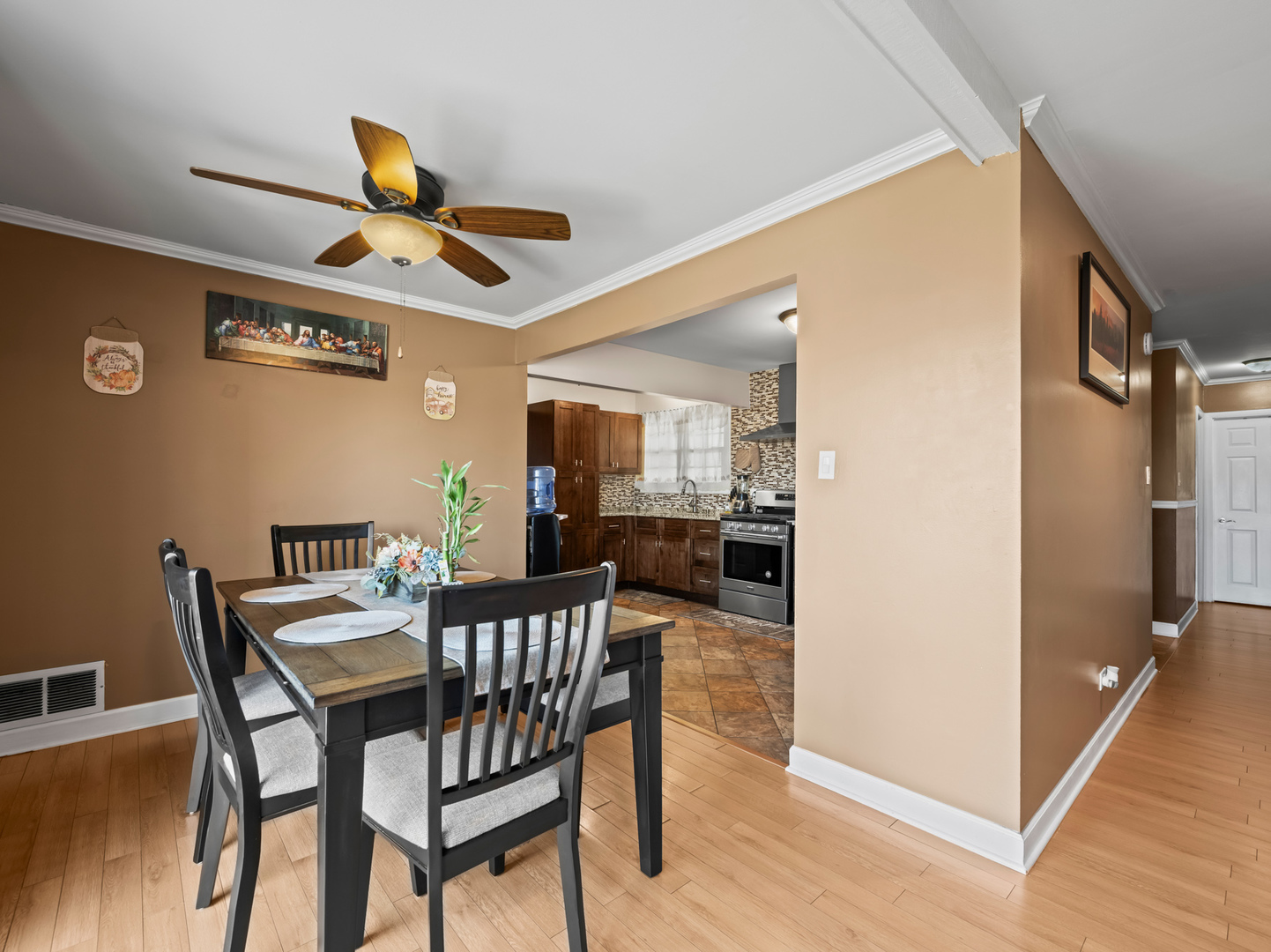 1905 Pierce Road Hoffman Estates, IL 60169 - Photo 7 of 27 a view of a dining room with furniture and wooden floor