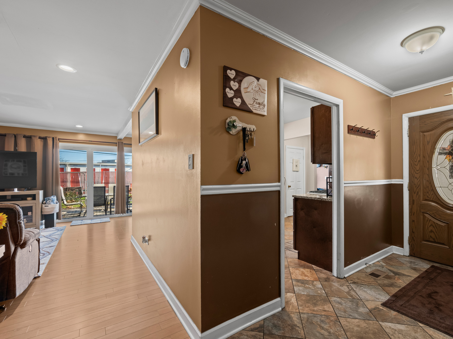 1905 Pierce Road Hoffman Estates, IL 60169 - Photo 9 of 27 a kitchen with stainless steel appliances granite countertop a refrigerator and a sink