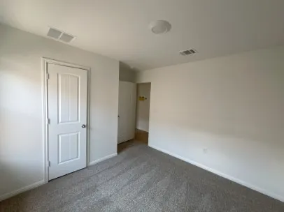 a view of hallway with stairs