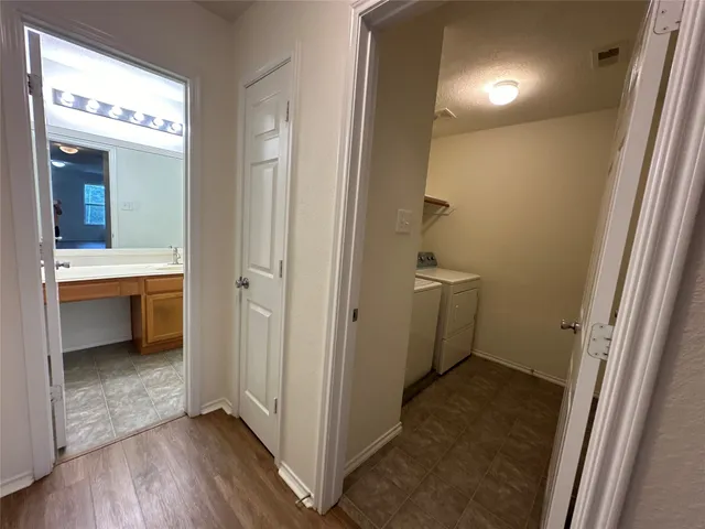 a utility room with dryer and washer