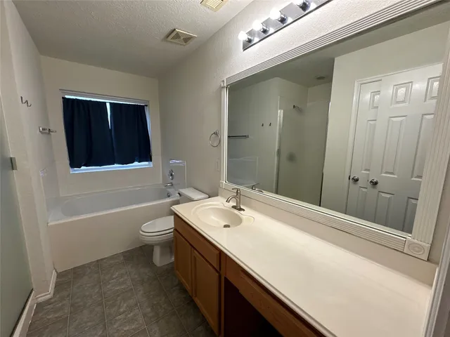 a bathroom with a bathtub