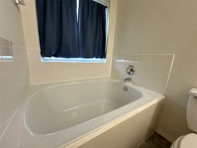 a view of backyard with cabin