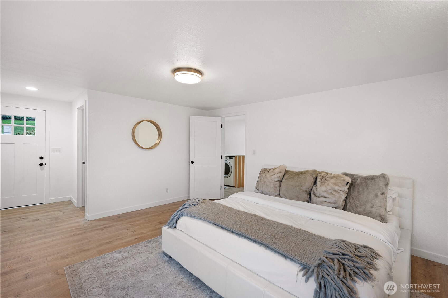 1406 Shattuck Avenue South Renton, WA 98055 - Photo 15 of 22 a bedroom with a bed and a window