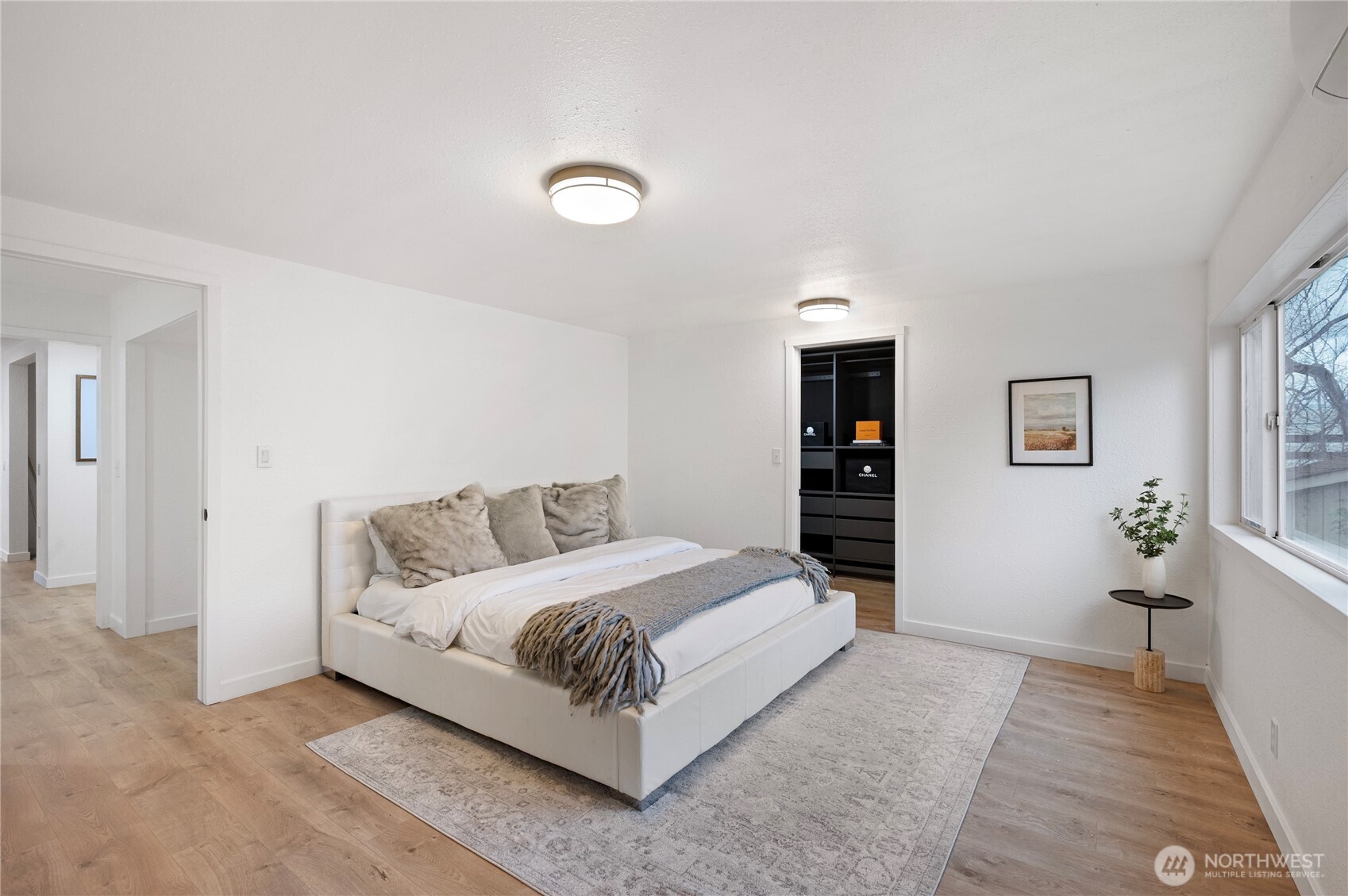 1406 Shattuck Avenue South Renton, WA 98055 - Photo 16 of 22 a bedroom with a bed and a large mirror