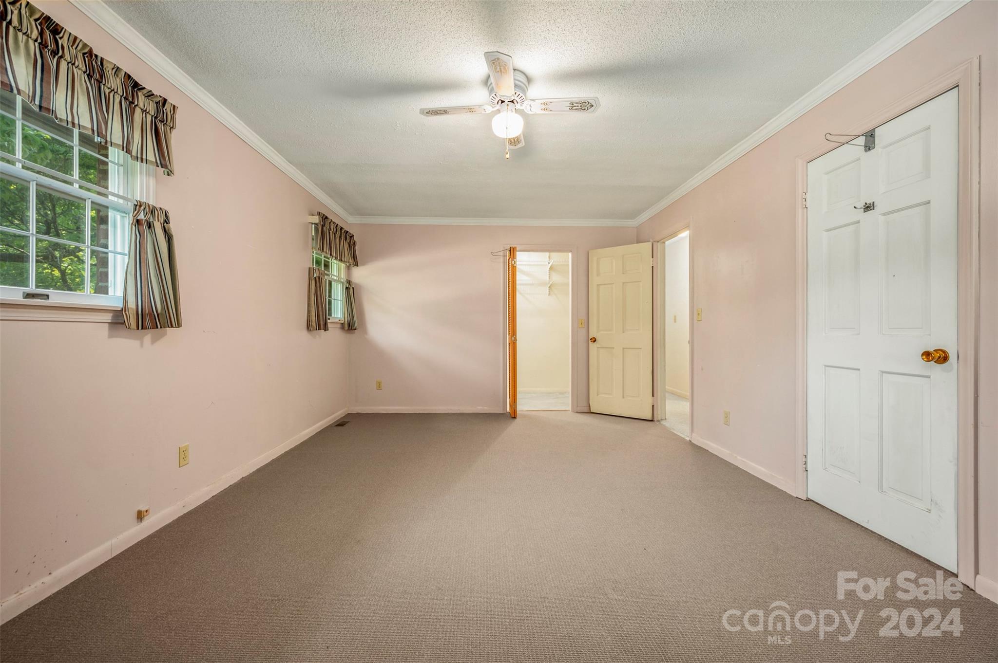 280 Dug Hill Road Landrum, SC 29356 - Photo 20 of 45 a view of a big room with windows and chandelier fan