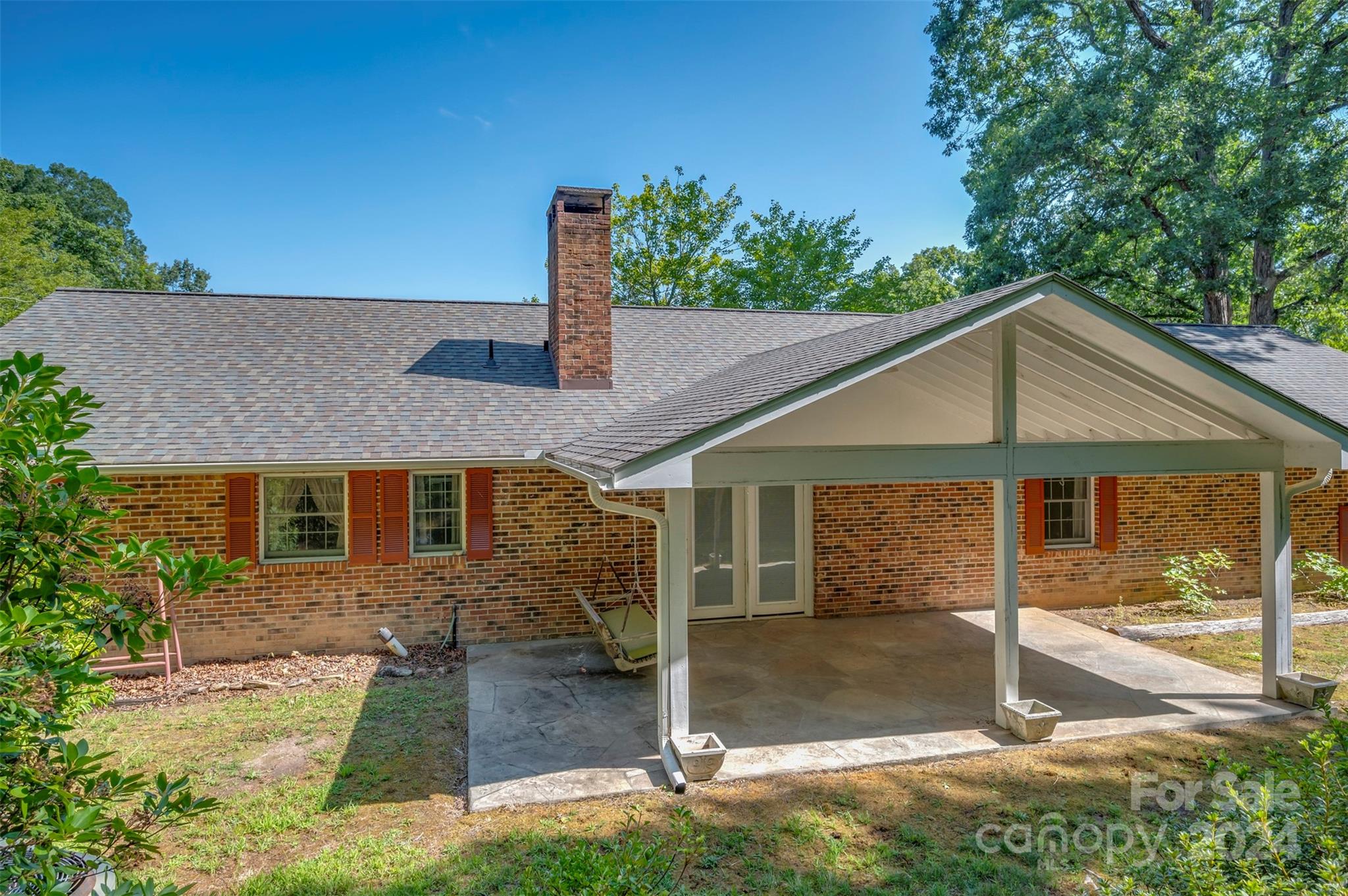 280 Dug Hill Road Landrum, SC 29356 - Photo 34 of 45 a house that has a tree in front of it