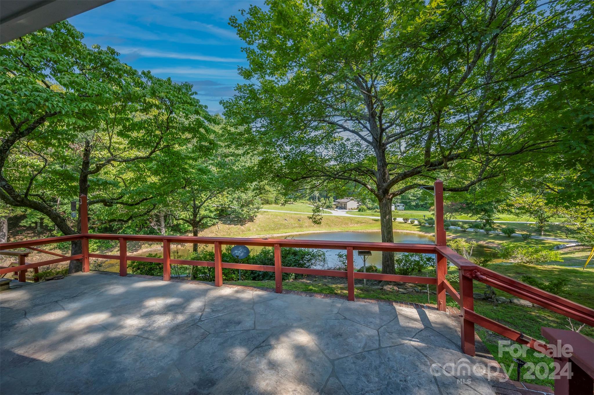 280 Dug Hill Road Landrum, SC 29356 - Photo 4 of 45 a view of a yard with large trees