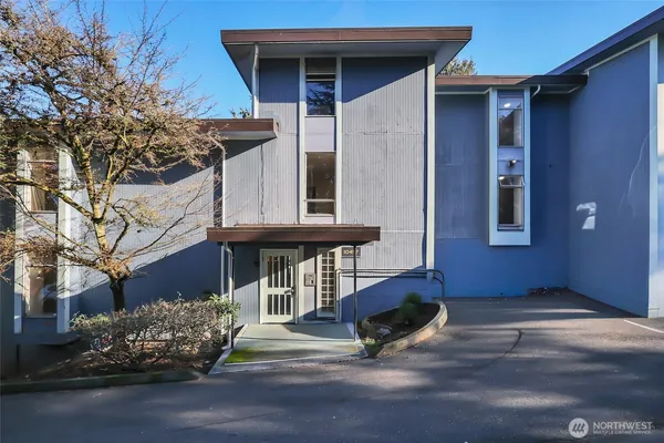 a view of a house with a street