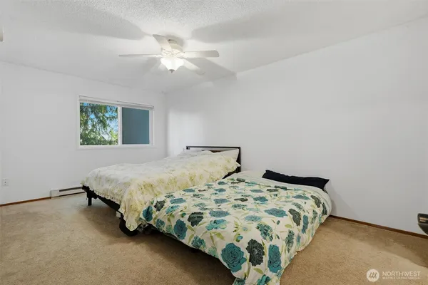 a view of a livingroom with a ceiling fan