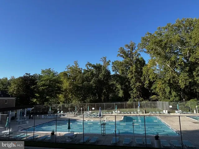 a view of car parked on the side of the road