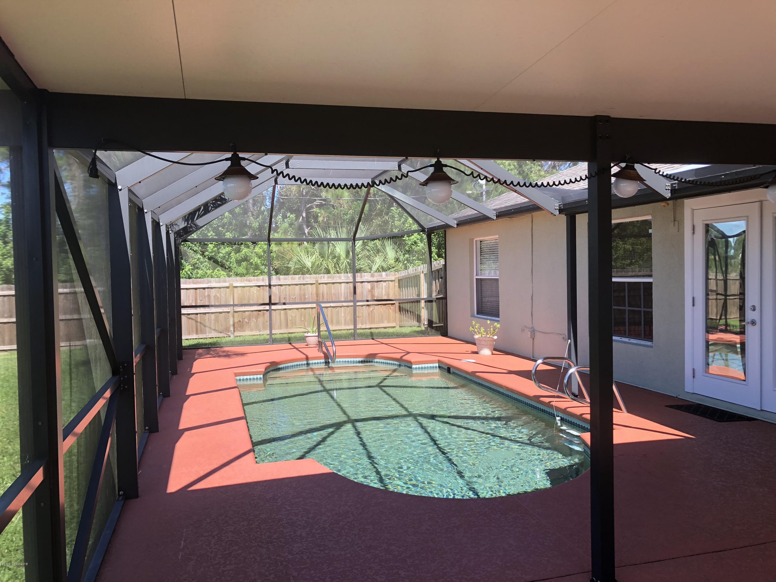 969 Ray Road Southeast Palm Bay, FL 32909 - Photo 14 of 22 a room with window and outdoor view