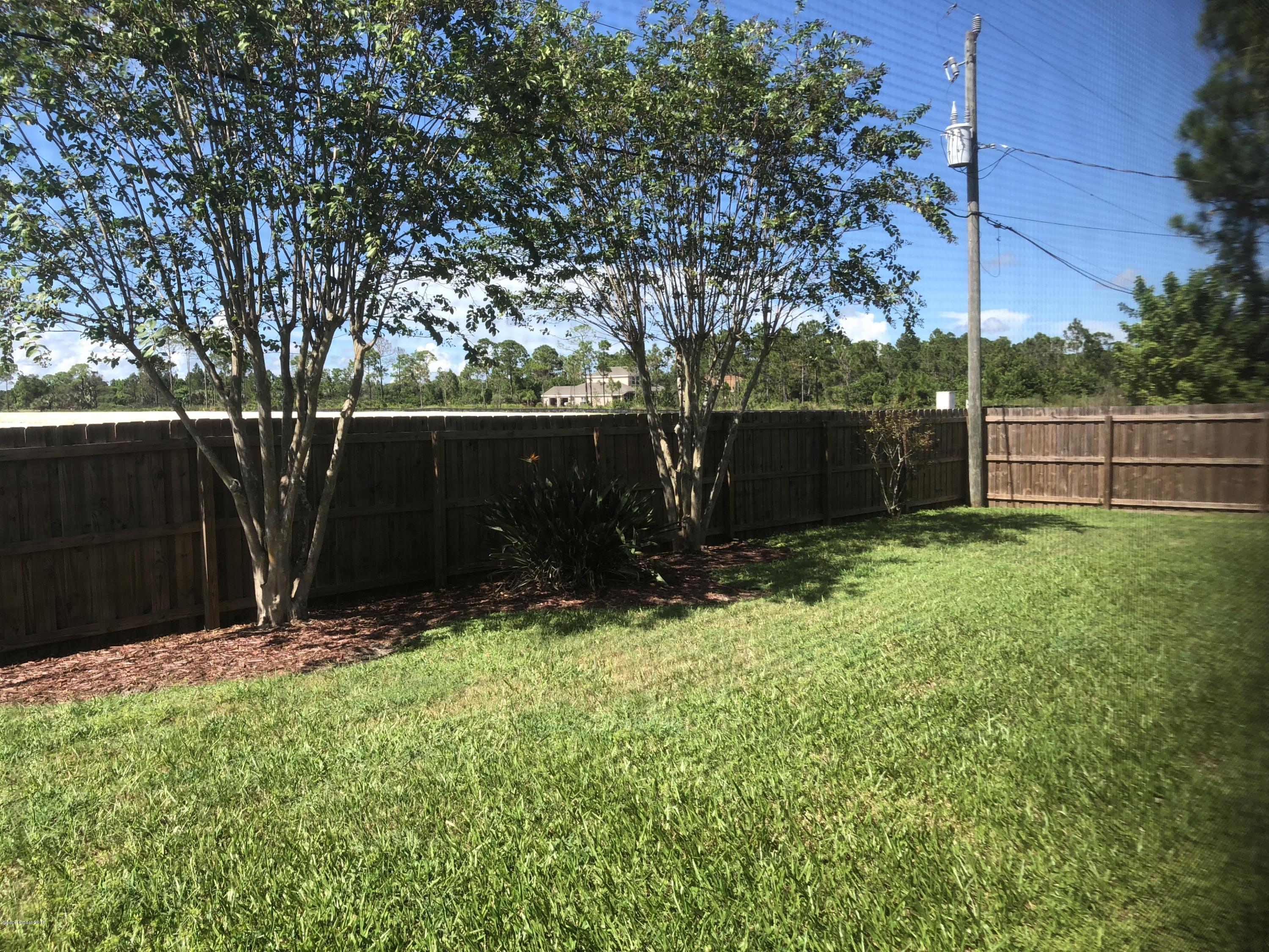 969 Ray Road Southeast Palm Bay, FL 32909 - Photo 16 of 22 a view of outdoor space and yard