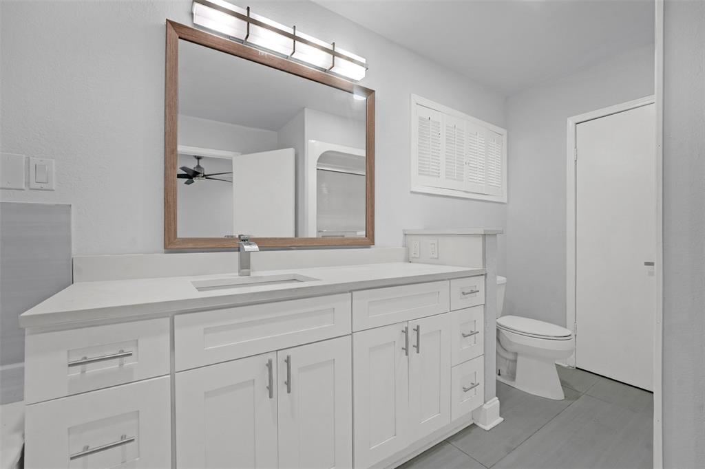 10525 Post Oak Bend Lane Wills Point, TX 75169 - Photo 14 of 40 Bathroom with vanity, a stall shower, and light tile patterned flooring