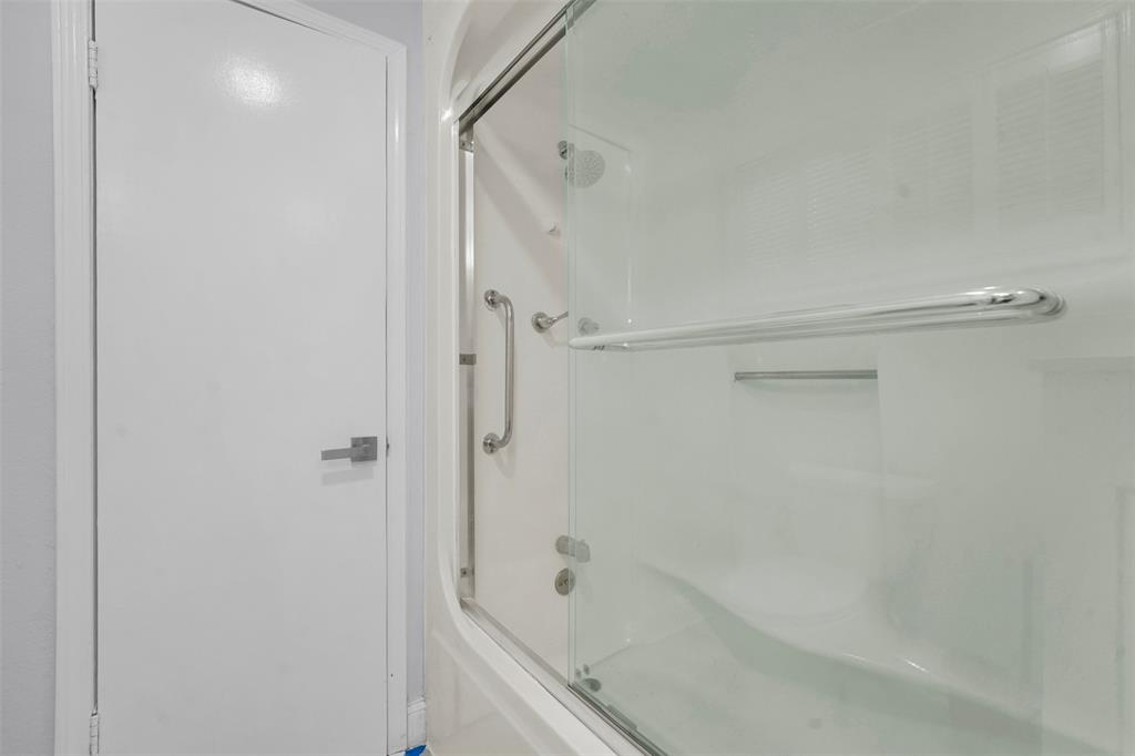 10525 Post Oak Bend Lane Wills Point, TX 75169 - Photo 15 of 40 Bathroom featuring combined bath / shower with glass door