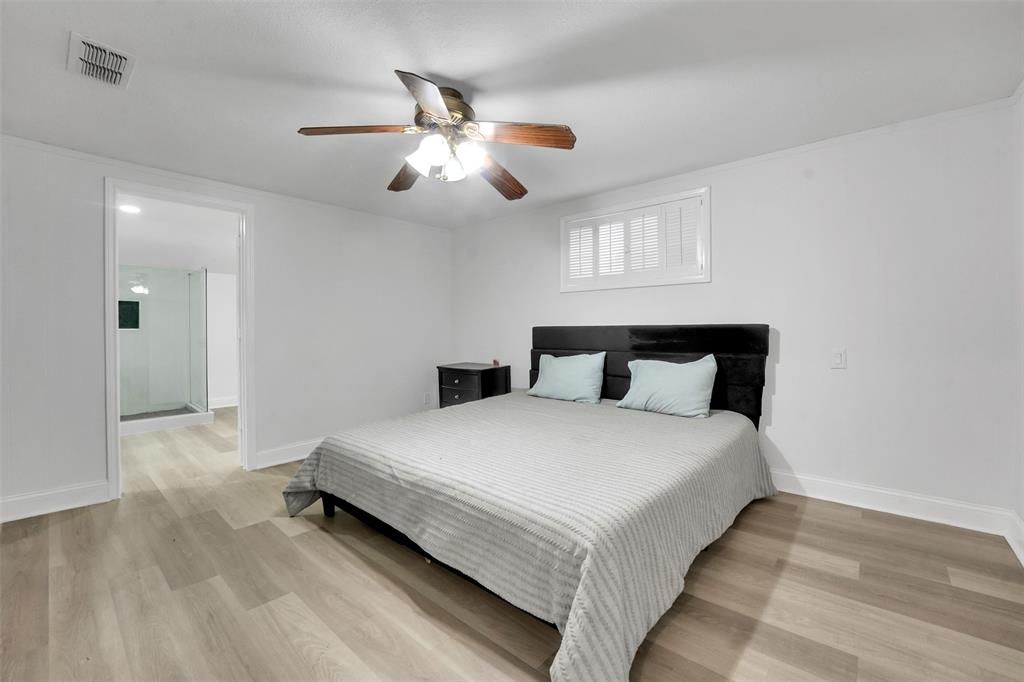 10525 Post Oak Bend Lane Wills Point, TX 75169 - Photo 19 of 40 Bedroom featuring light wood-style floors and ceiling fan