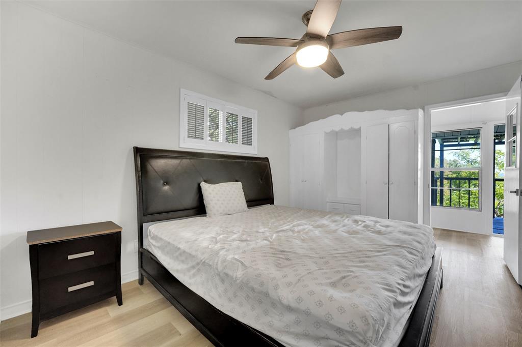 10525 Post Oak Bend Lane Wills Point, TX 75169 - Photo 26 of 40 Bedroom featuring wood finished floors and ceiling fan