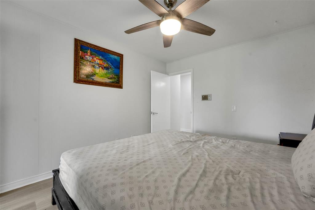 10525 Post Oak Bend Lane Wills Point, TX 75169 - Photo 27 of 40 Bedroom with wood finished floors and ceiling fan