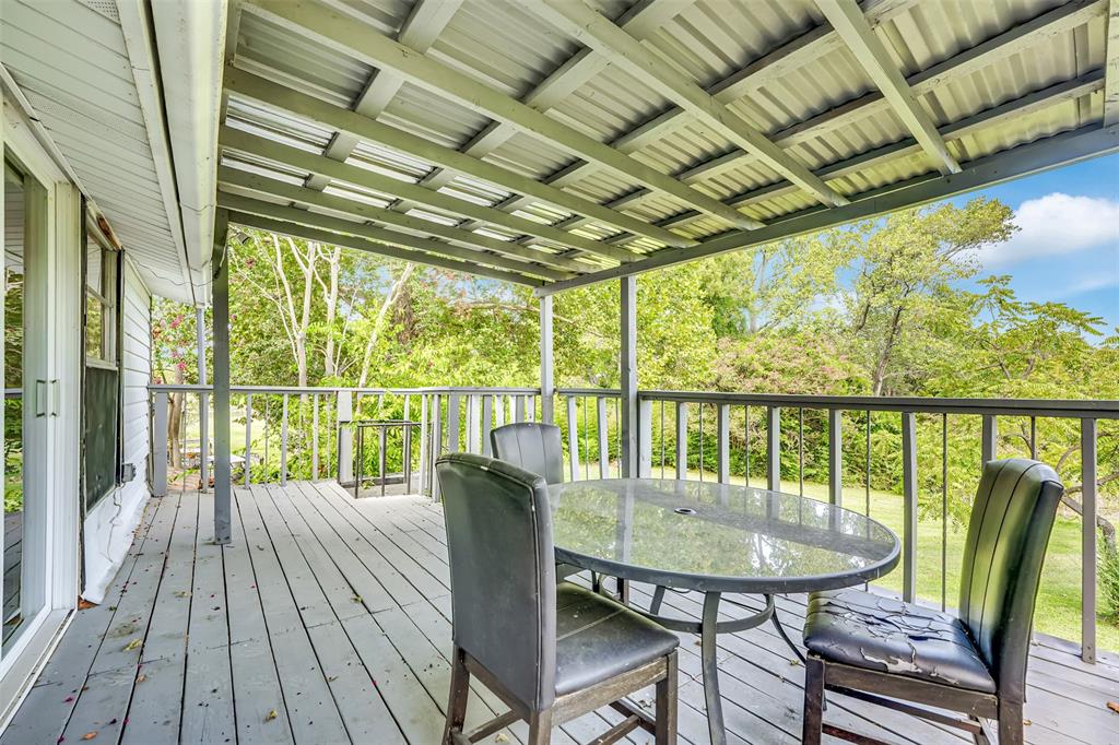 10525 Post Oak Bend Lane Wills Point, TX 75169 - Photo 31 of 40 Wooden terrace with outdoor dining space