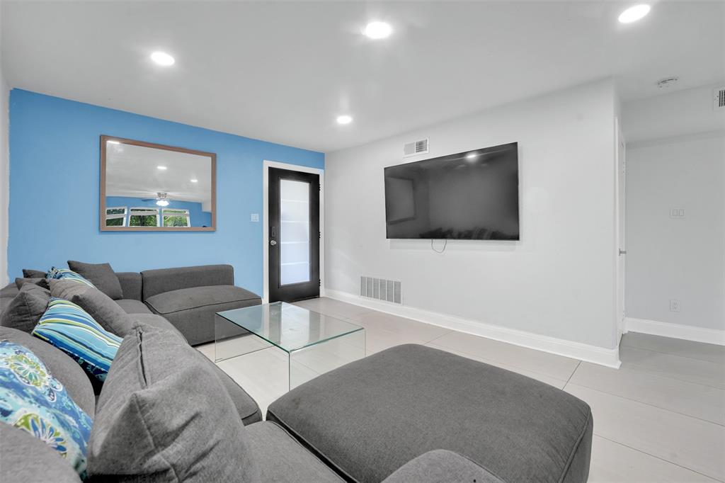 10525 Post Oak Bend Lane Wills Point, TX 75169 - Photo 4 of 40 Living room featuring recessed lighting and light tile patterned floors
