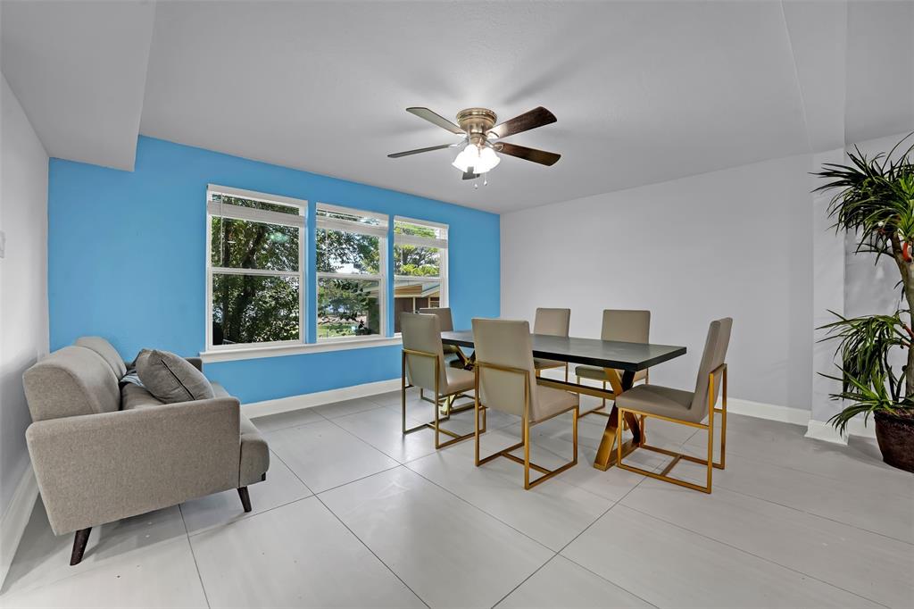 10525 Post Oak Bend Lane Wills Point, TX 75169 - Photo 5 of 40 Dining area with light tile patterned flooring and ceiling fan