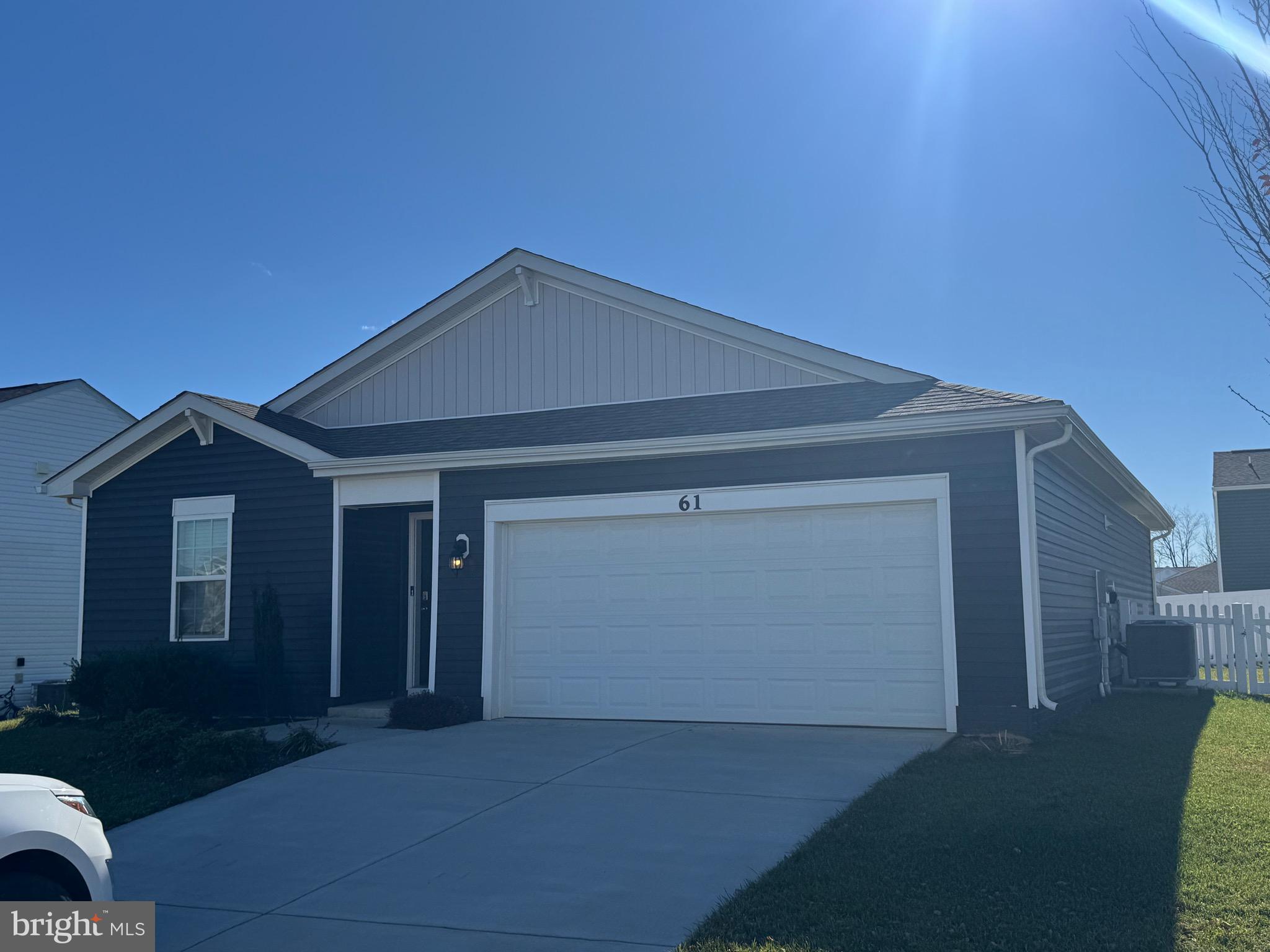 61 Bar Harbor Terrace Charles Town, WV 25414 - Photo 1 of 2 a front view of a house with yard