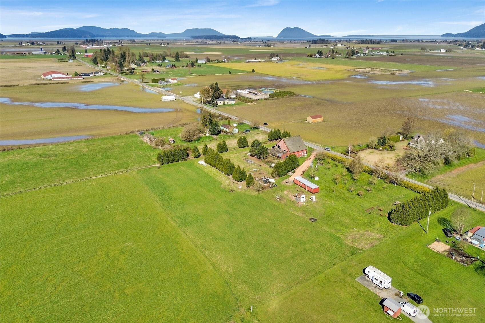 16068 Field Road Bow, WA 98232 - Photo 13 of 25 a view of an ocean and a mountain