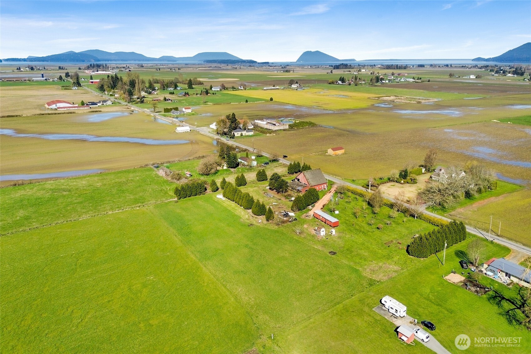 16068 Field Road Bow, WA 98232 - Photo 14 of 25 a view of an ocean and a mountain