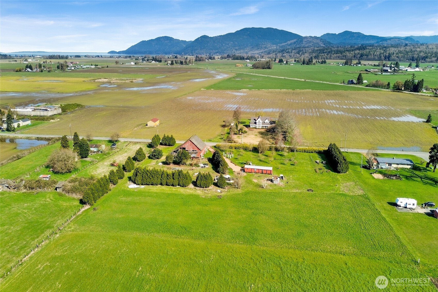 16068 Field Road Bow, WA 98232 - Photo 15 of 25 a view of an ocean and a mountain