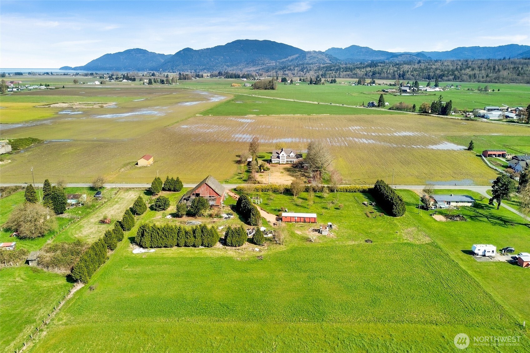 16068 Field Road Bow, WA 98232 - Photo 16 of 25 a view of an ocean and a mountain