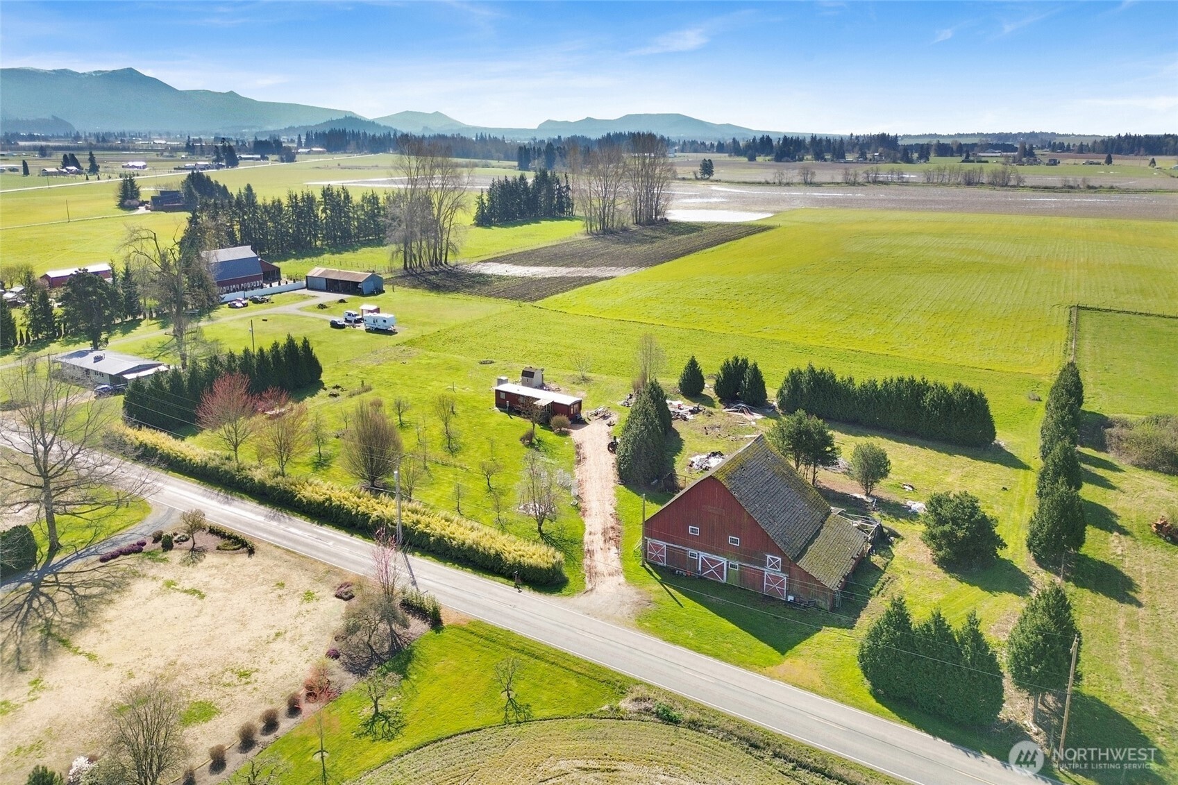 16068 Field Road Bow, WA 98232 - Photo 4 of 25 a view of a swimming pool with an ocean view