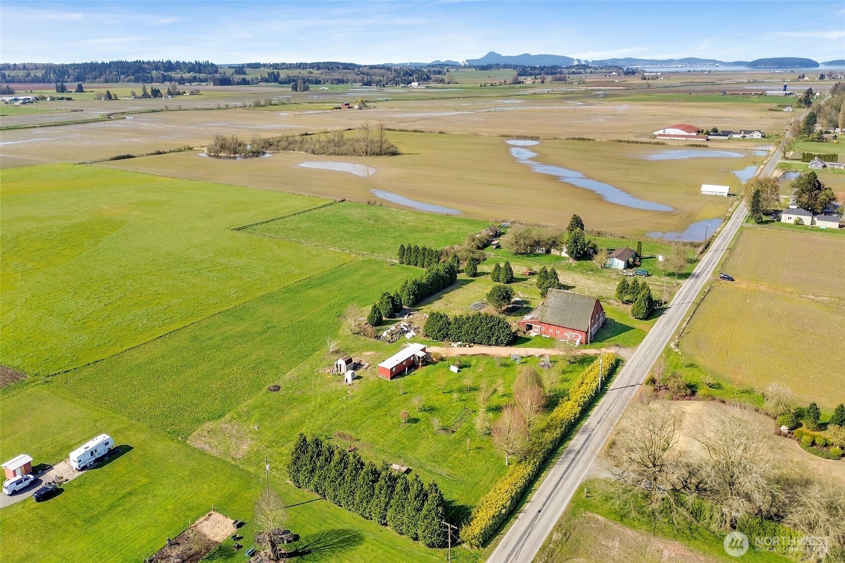 16068 Field Road Bow, WA 98232 - Photo 9 of 25 a view of an ocean from a balcony