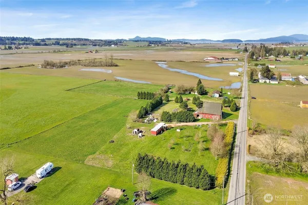 a view of a lake with a big yard