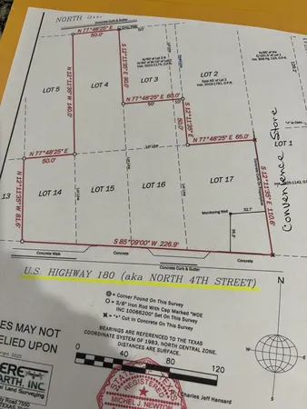 a view of a road with an ocean view