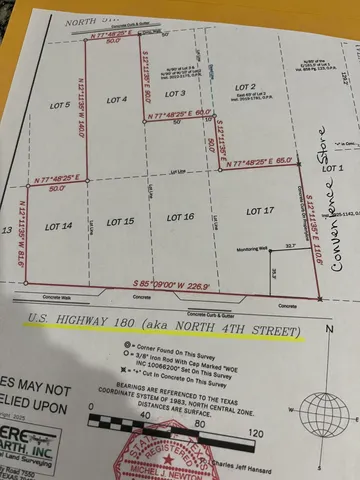 a view of a road with an ocean view